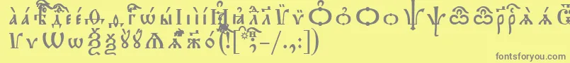 Czcionka TriodionIeucsSpacedout – szare czcionki na żółtym tle