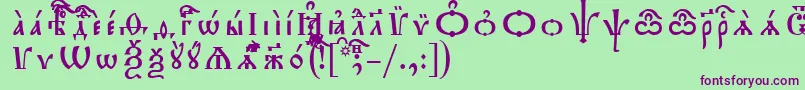 フォントTriodionIeucsSpacedout – 緑の背景に紫のフォント