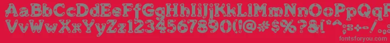 フォントMerkins – 赤い背景に灰色の文字