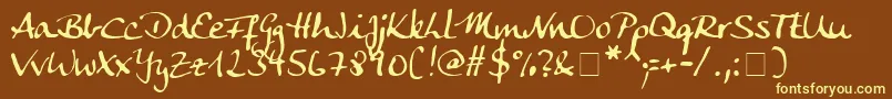 AnkeCalligraphicFg Font – Yellow Fonts on Brown Background