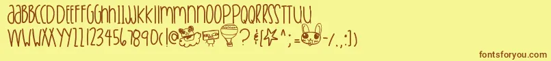 Breakfromtoronto-Schriftart – Braune Schriften auf gelbem Hintergrund