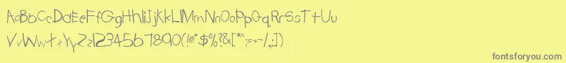 TrionaaRegular Font – Gray Fonts on Yellow Background