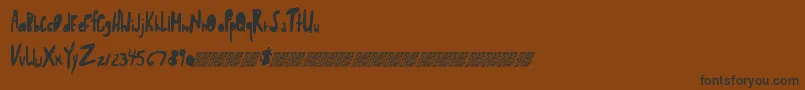 フォントShwedybawls – 黒い文字が茶色の背景にあります