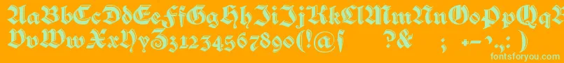 Verzierteschwabacher-Schriftart – Grüne Schriften auf orangefarbenem Hintergrund