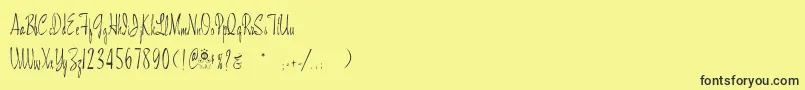 フォントMaidstonescript – 黒い文字の黄色い背景