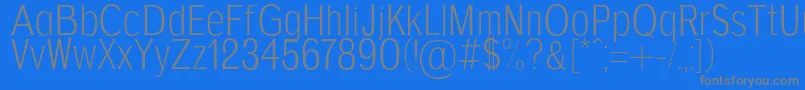 フォントAgajdaRegular – 青い背景に灰色の文字