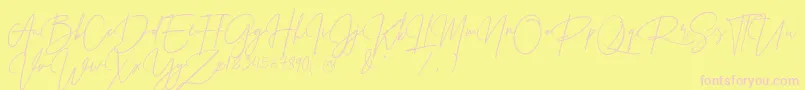 Czcionka PrestigeSignatureScriptDemo – różowe czcionki na żółtym tle
