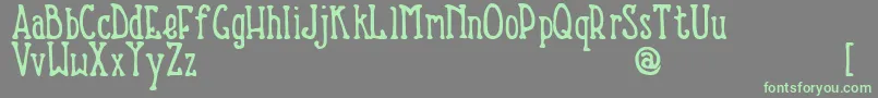 NevinsHand Font – Green Fonts on Gray Background