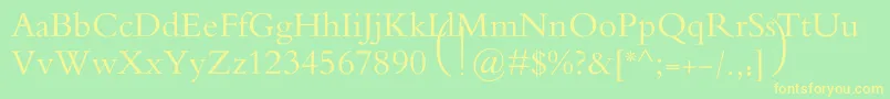 フォントMotkenAlRafidain – 黄色の文字が緑の背景にあります