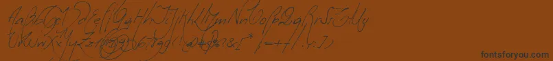 フォントMilonguitaAlt – 黒い文字が茶色の背景にあります