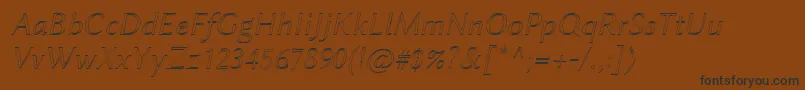 フォントLinbiolinumAui – 黒い文字が茶色の背景にあります