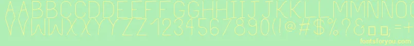 フォントPhilippineLight – 黄色の文字が緑の背景にあります