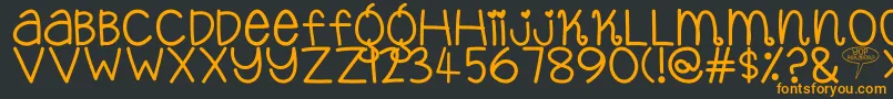 フォントYopPekabor – 黒い背景にオレンジの文字