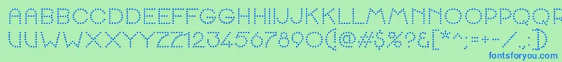 K22SpottyFace Font – Blue Fonts on Green Background