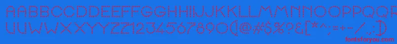 K22SpottyFace Font – Red Fonts on Blue Background