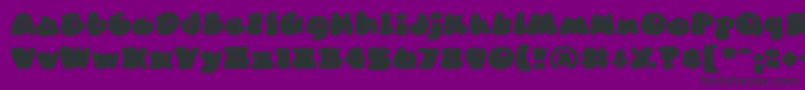 DuncecapbbReg Font – Black Fonts on Purple Background