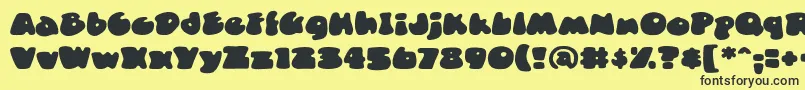 DuncecapbbReg Font – Black Fonts on Yellow Background