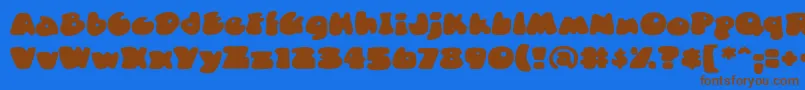 DuncecapbbReg Font – Brown Fonts on Blue Background