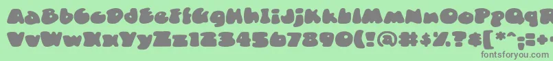 DuncecapbbReg Font – Gray Fonts on Green Background