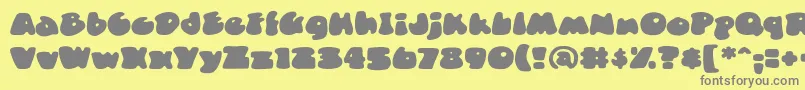 DuncecapbbReg Font – Gray Fonts on Yellow Background