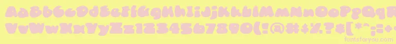 DuncecapbbReg Font – Pink Fonts on Yellow Background