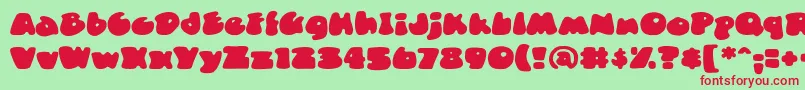 DuncecapbbReg Font – Red Fonts on Green Background