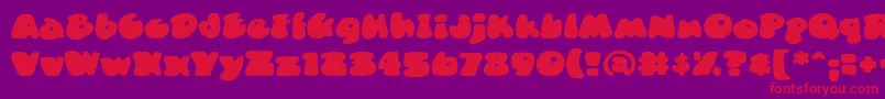 DuncecapbbReg Font – Red Fonts on Purple Background
