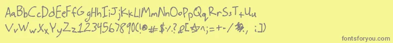 フォントStutzman – 黄色の背景に灰色の文字