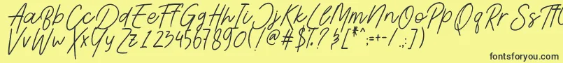 Шрифт AesthetikScriptDemo – чёрные шрифты на жёлтом фоне