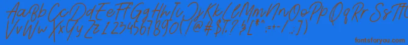 Шрифт AesthetikScriptDemo – коричневые шрифты на синем фоне