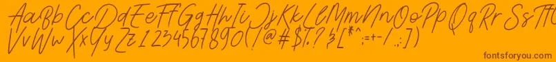 Шрифт AesthetikScriptDemo – коричневые шрифты на оранжевом фоне