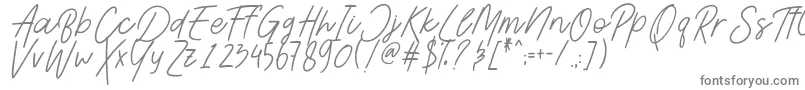 フォントAesthetikScriptDemo – 白い背景に灰色の文字