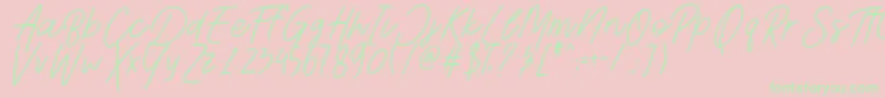 Шрифт AesthetikScriptDemo – зелёные шрифты на розовом фоне