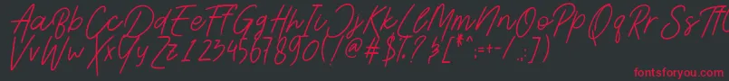 Шрифт AesthetikScriptDemo – красные шрифты на чёрном фоне