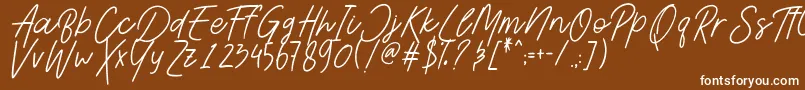 Шрифт AesthetikScriptDemo – белые шрифты на коричневом фоне