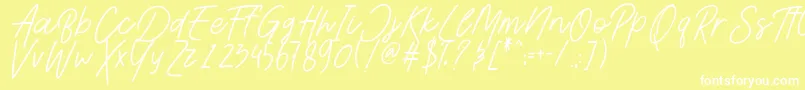 Шрифт AesthetikScriptDemo – белые шрифты на жёлтом фоне