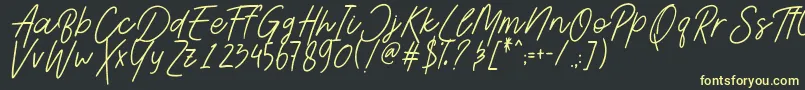 フォントAesthetikScriptDemo – 黒い背景に黄色の文字