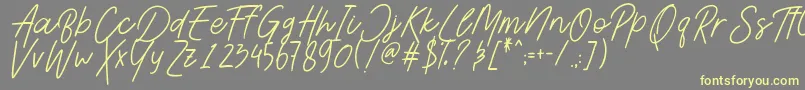 AesthetikScriptDemo-Schriftart – Gelbe Schriften auf grauem Hintergrund