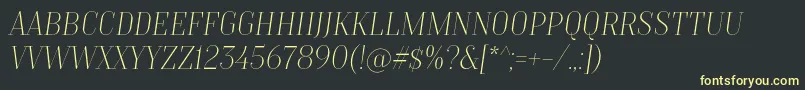Шрифт TtMoonsThinItalicDemo – жёлтые шрифты на чёрном фоне