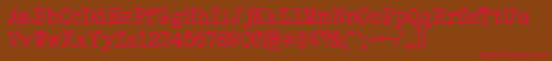 VeteranTypewriter Font – Red Fonts on Brown Background
