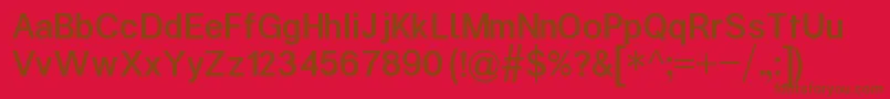 KalypsaMedium-Schriftart – Braune Schriften auf rotem Hintergrund