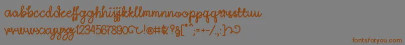 Saiba mais sobre a fonte LightheartScriptRegular Fonte LightheartScriptRegular – fontes marrons em um fundo cinza