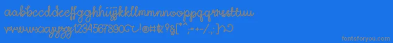 Więcej informacji o czcionce LightheartScriptRegular Czcionka LightheartScriptRegular – szare czcionki na niebieskim tle