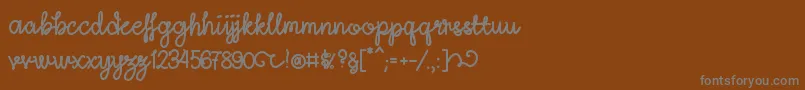 More about LightheartScriptRegular Font LightheartScriptRegular Font – Gray Fonts on Brown Background