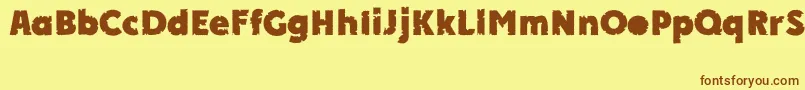 APlakatcmplbtdExtrabold Font – Brown Fonts on Yellow Background