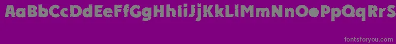 Fonte APlakatcmplbtdExtrabold – fontes cinzas em um fundo violeta