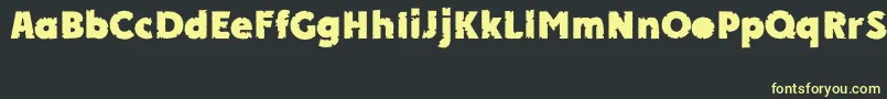 APlakatcmplbtdExtrabold Font – Yellow Fonts on Black Background