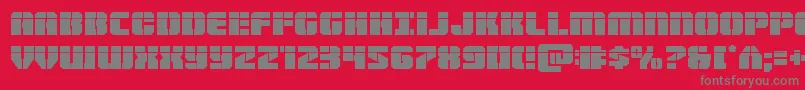 フォントWarpthrusterlaser – 赤い背景に灰色の文字