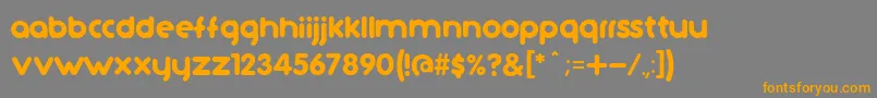 フォントTutanoCcV2 – オレンジの文字は灰色の背景にあります。