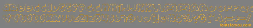 フォントLionels – オレンジの文字は灰色の背景にあります。